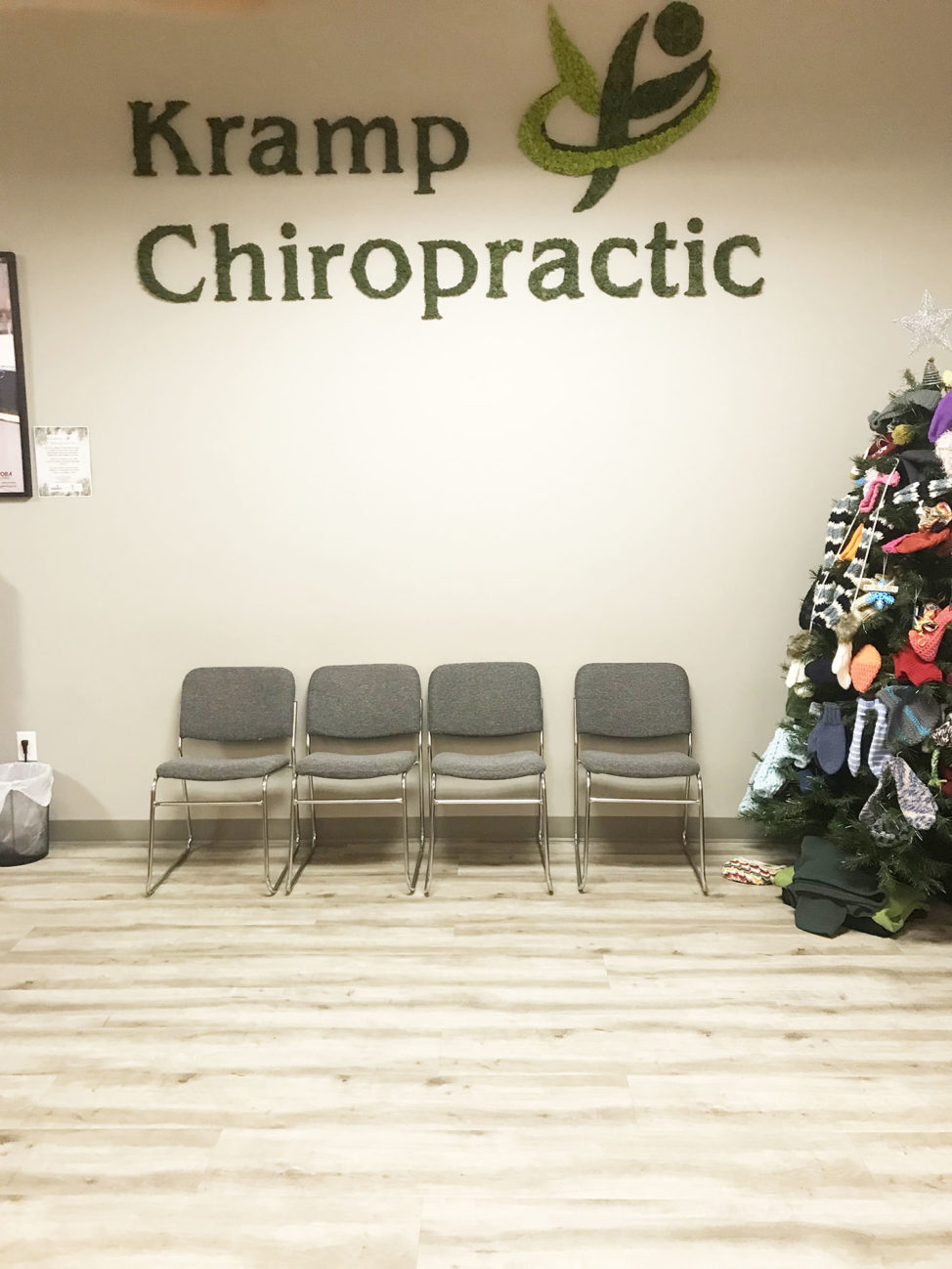 Preserved moss logo at Kramp Chiropractic in Winnipeg